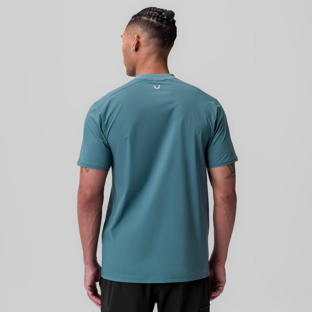 1087. Tetra-Lite® Ice Zip Tee - Storm